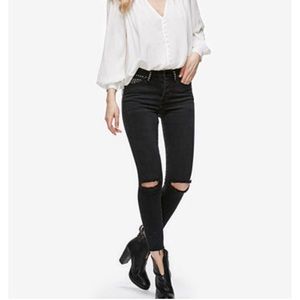 Free People Payton Black studded skinny jeans.
